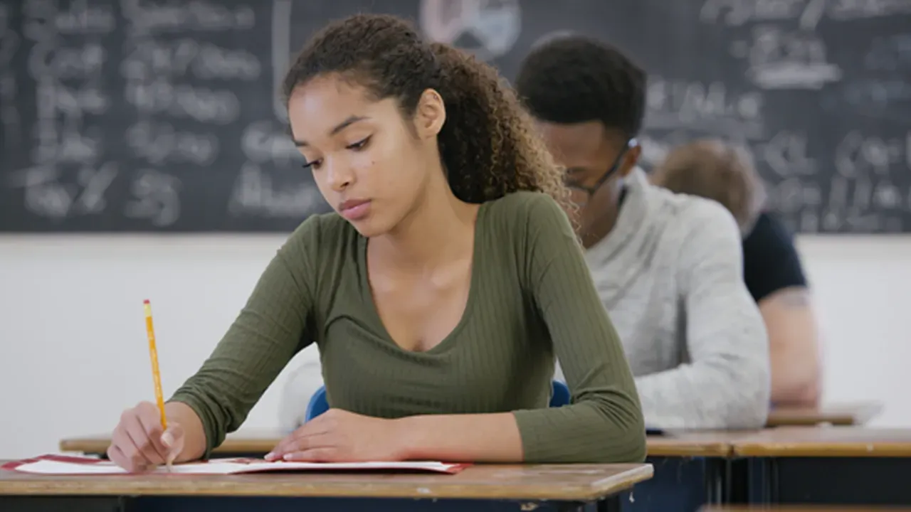 Student completing performance-based assignment