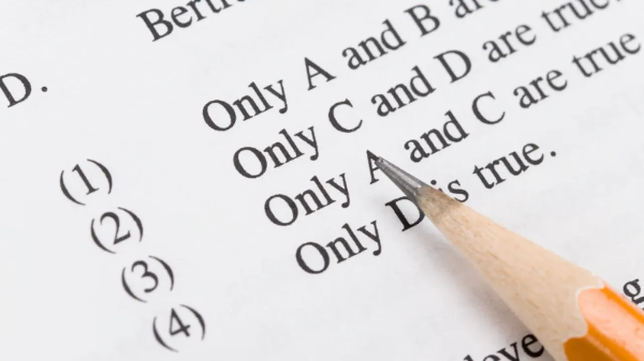 Student creating real-world exam questions