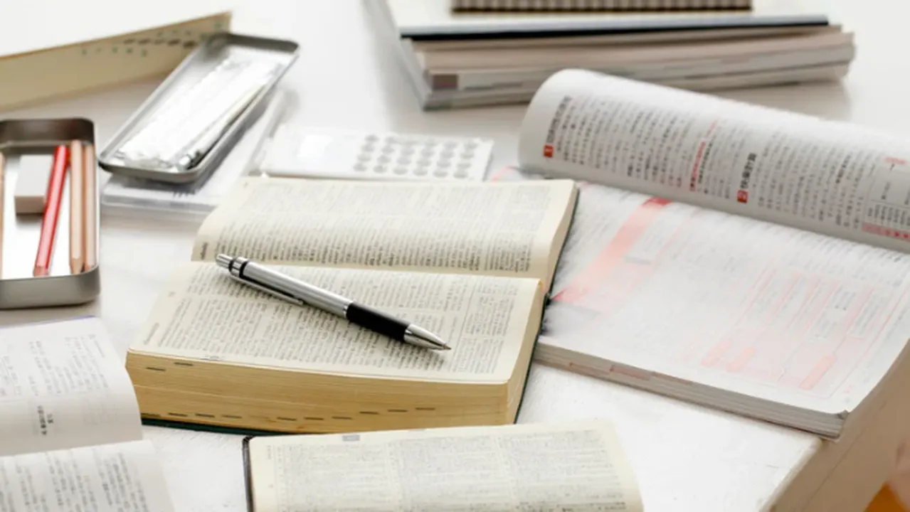 Student reading notes